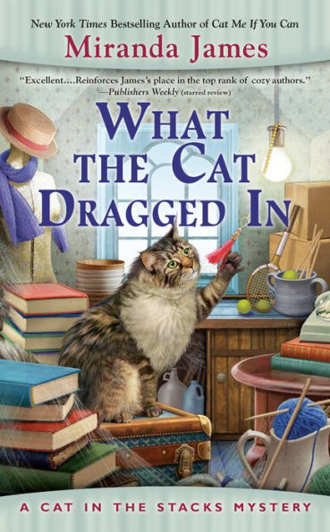 What The Cat Dragged In (Cat In The Stacks Mystery)