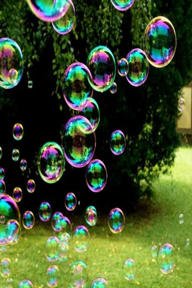 Soap Bubbles: A Soap Bubble Is An Extremely Thin Film Of Soapy Water Enclosing Air That Forms A Hollow Sphere With An Iridescent Sur
